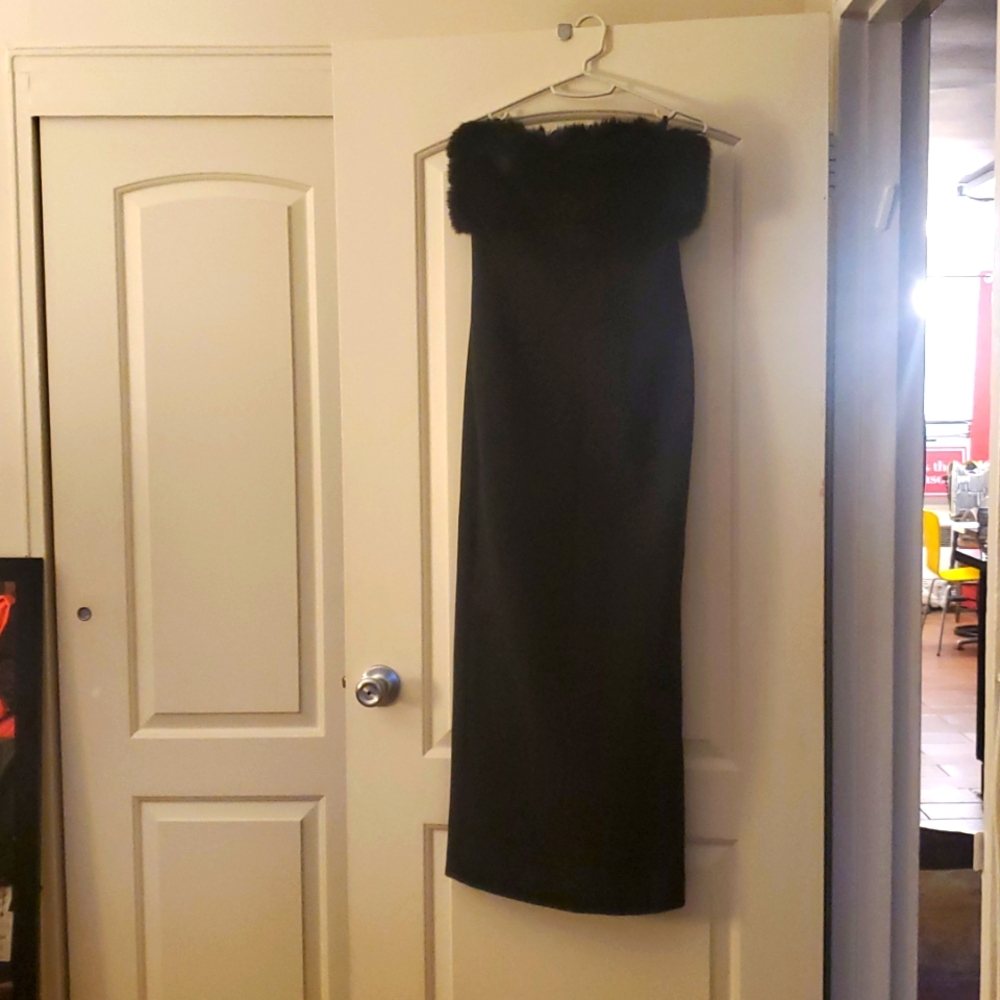 Elegant Black Strapless Dress straight neckline and faux fur appliqué detail.